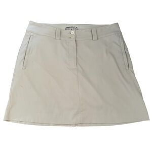 Nike Beige Golf Skort ~ 2 button zipped closure ~ side and back pockets ~ size M